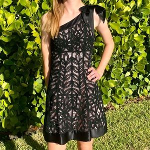 Betsey Johnson elegant black dress size 2.Excellent condition, side zipper.